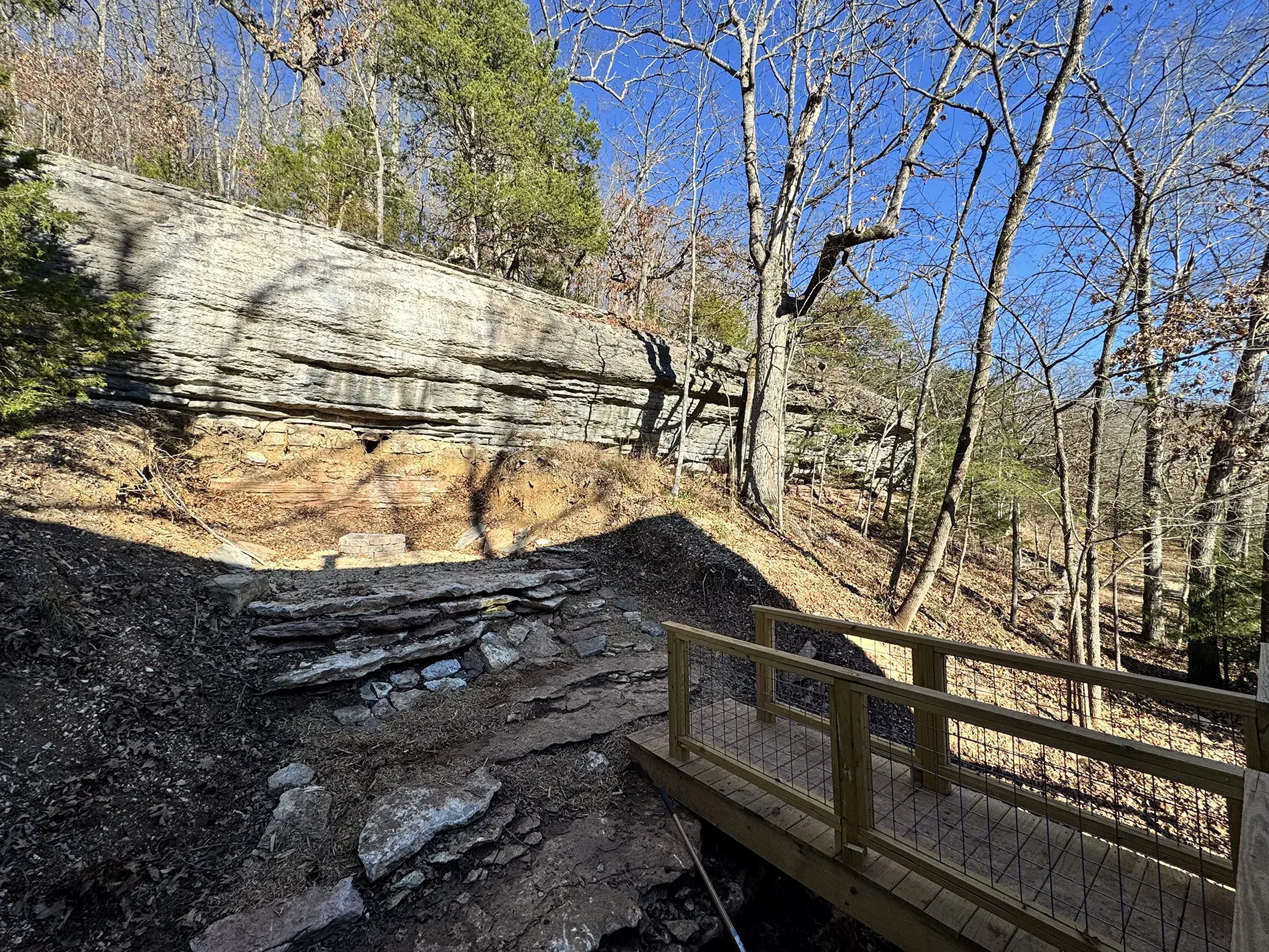 Wooden footbridge leading to the fire pit